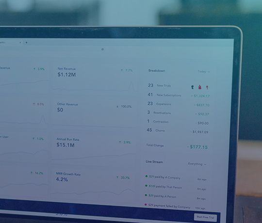 Close up of laptop with financial dashboard on screen
