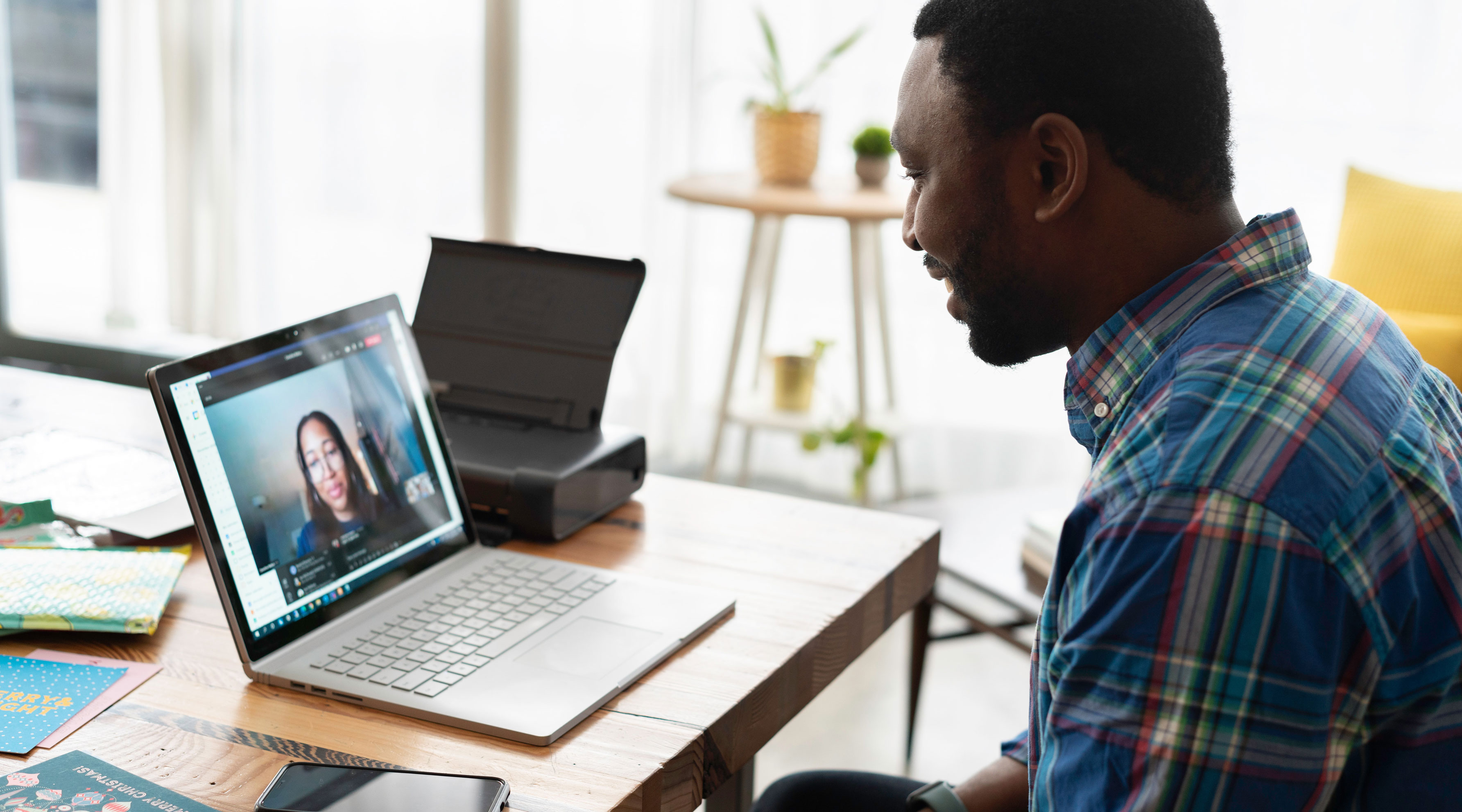 Person watching a Blue Sky eLearn webinar on a laptop