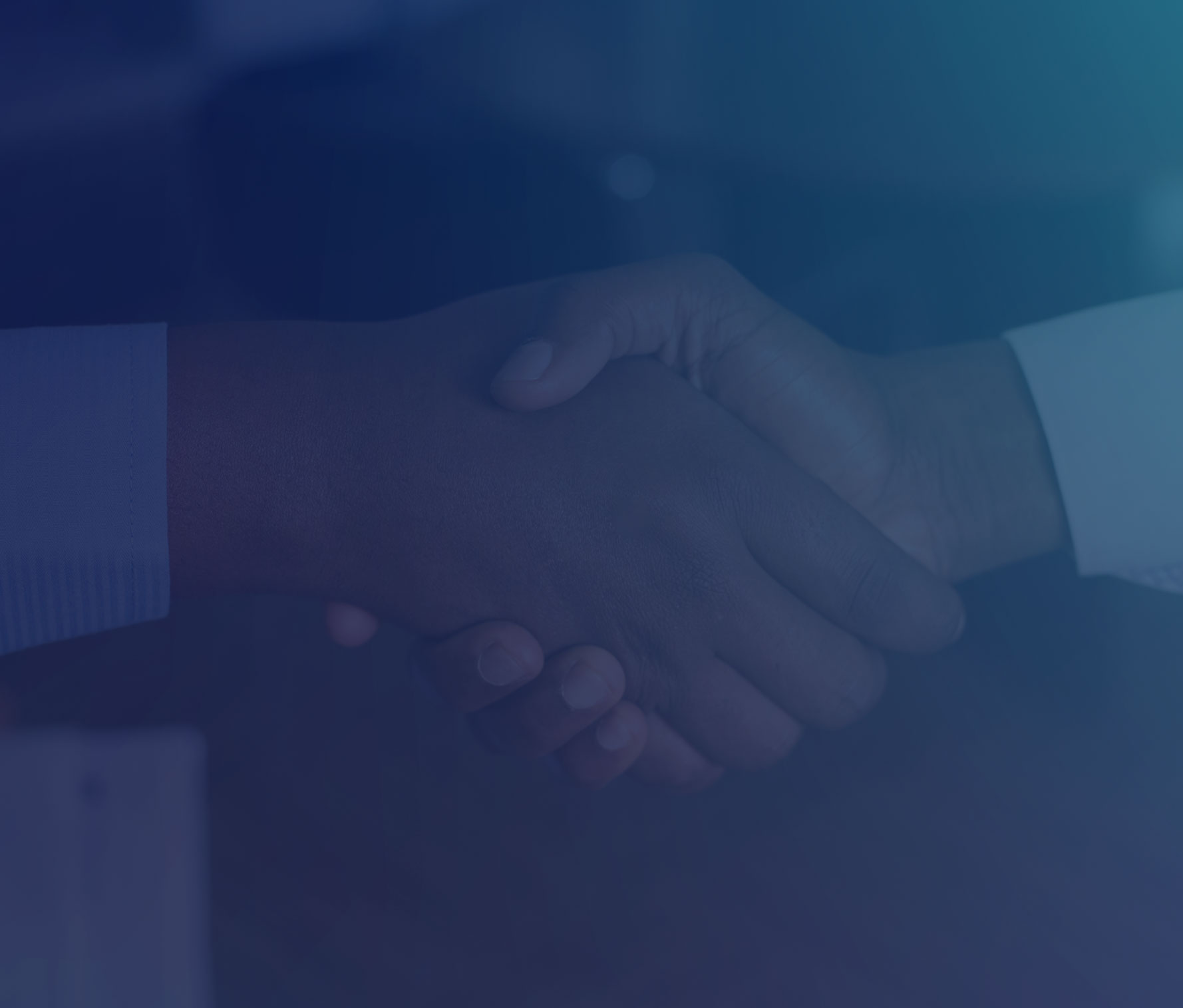 Two business partners shaking hands