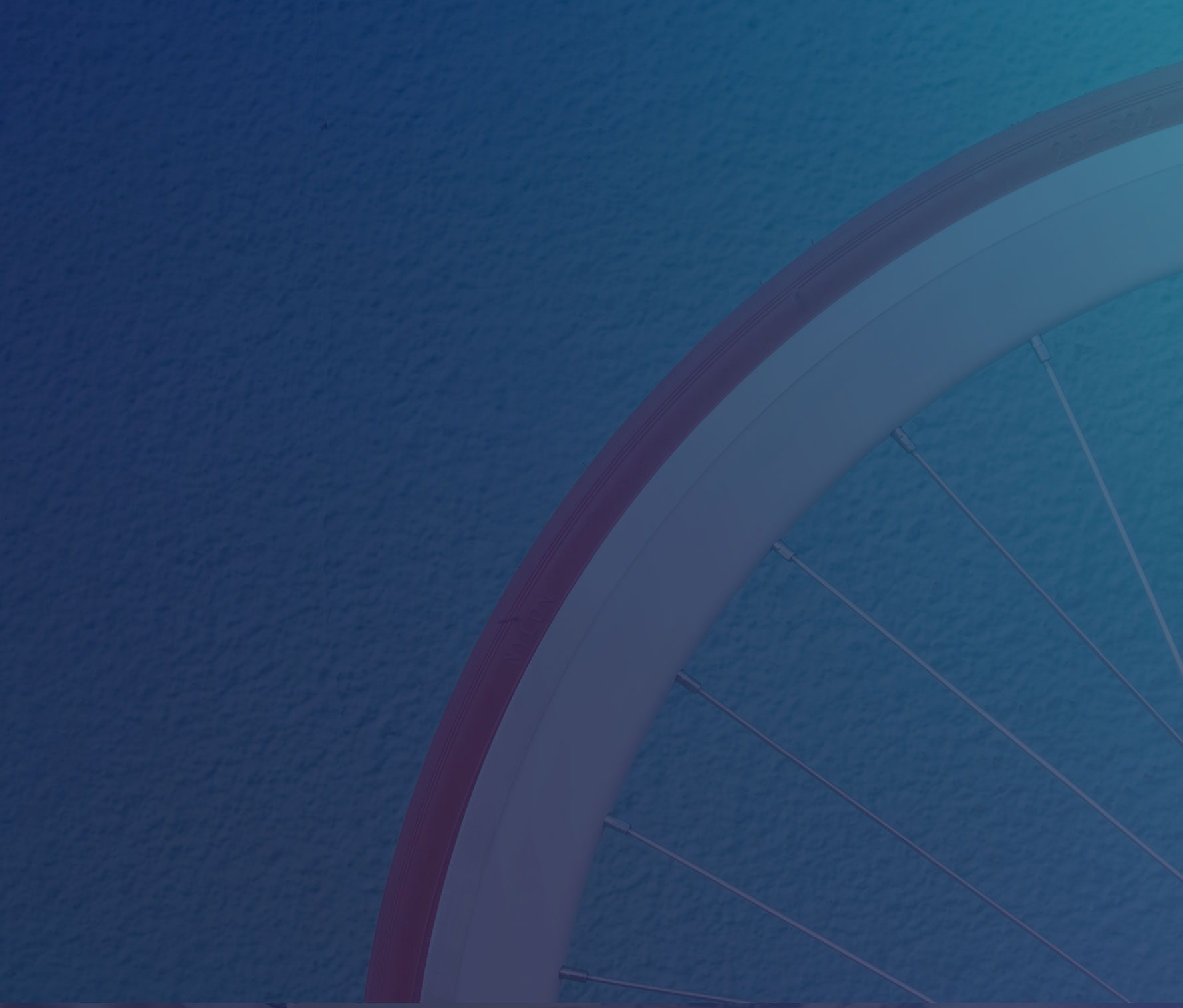 Cropped image of a red bicycle wheel