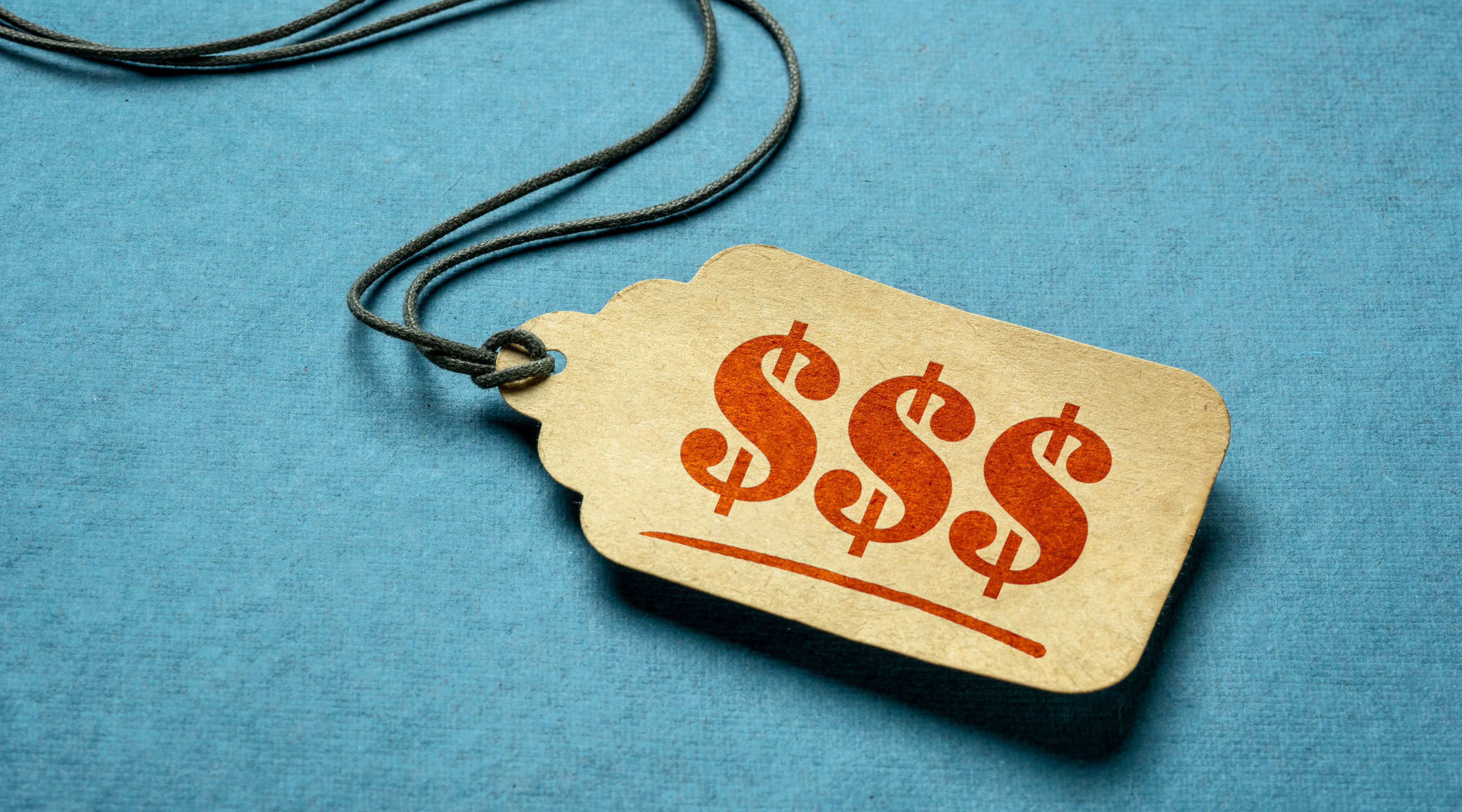 Price tag with three dollar signs