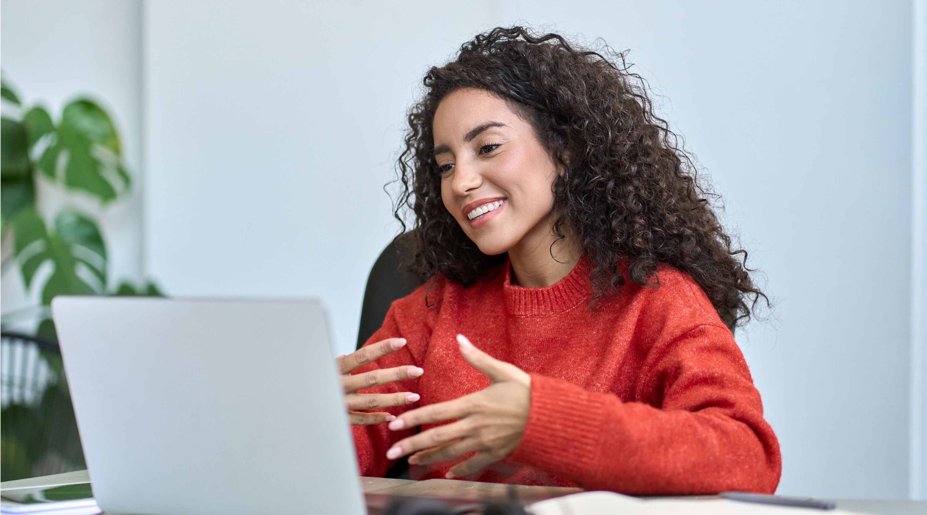 Woman taking a virtual learning course on a laptop