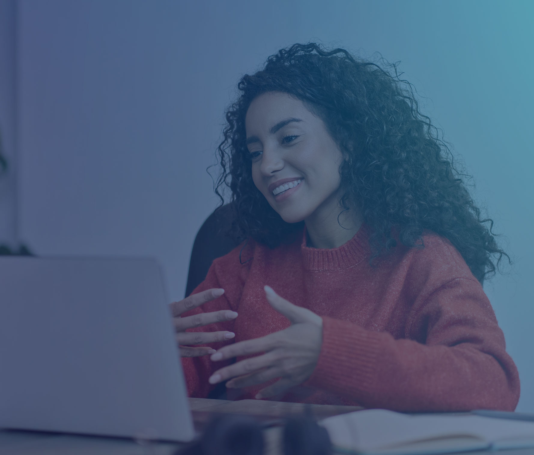 Woman taking a virtual learning course on a laptop