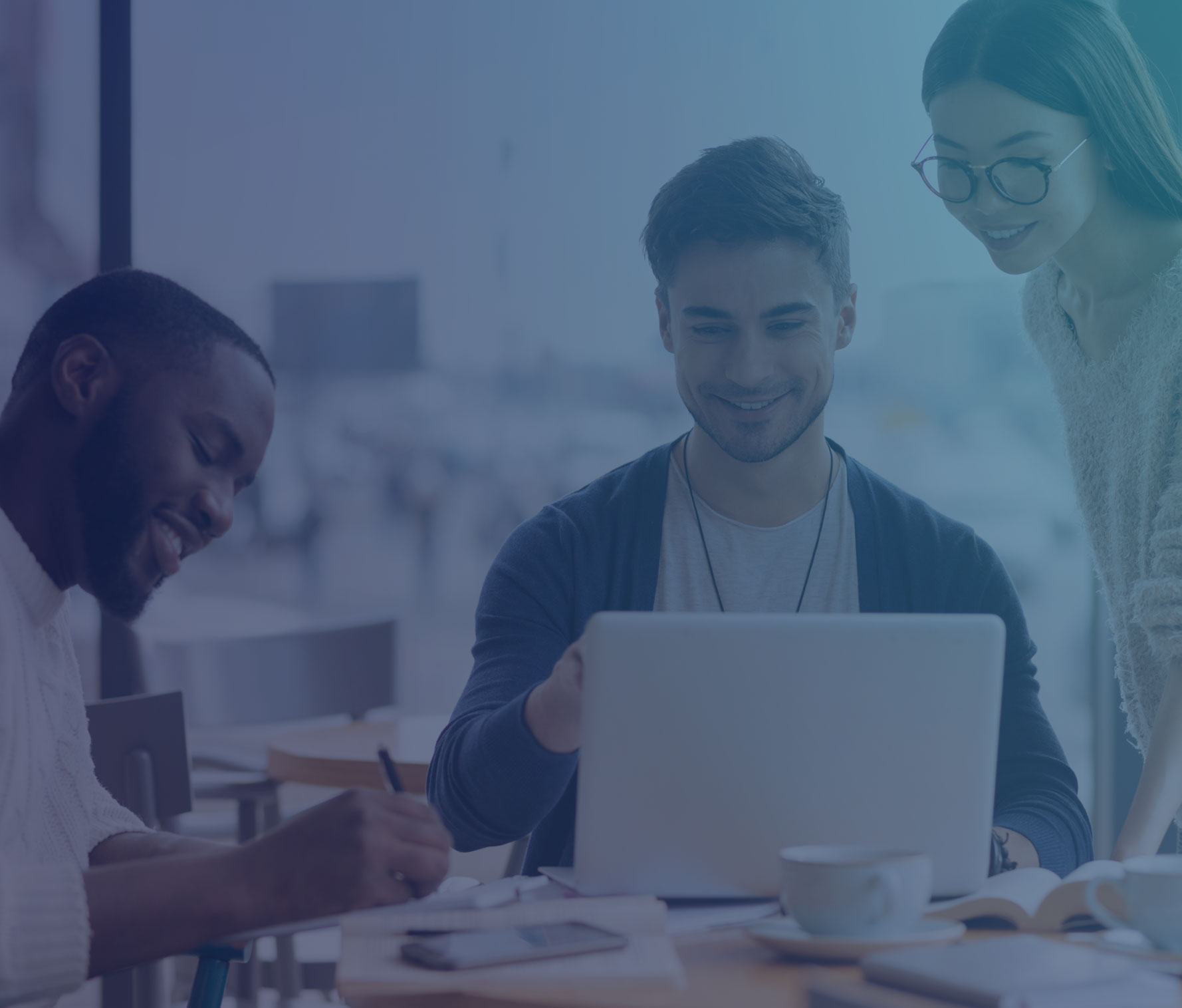 Three people collaborating about eLearning