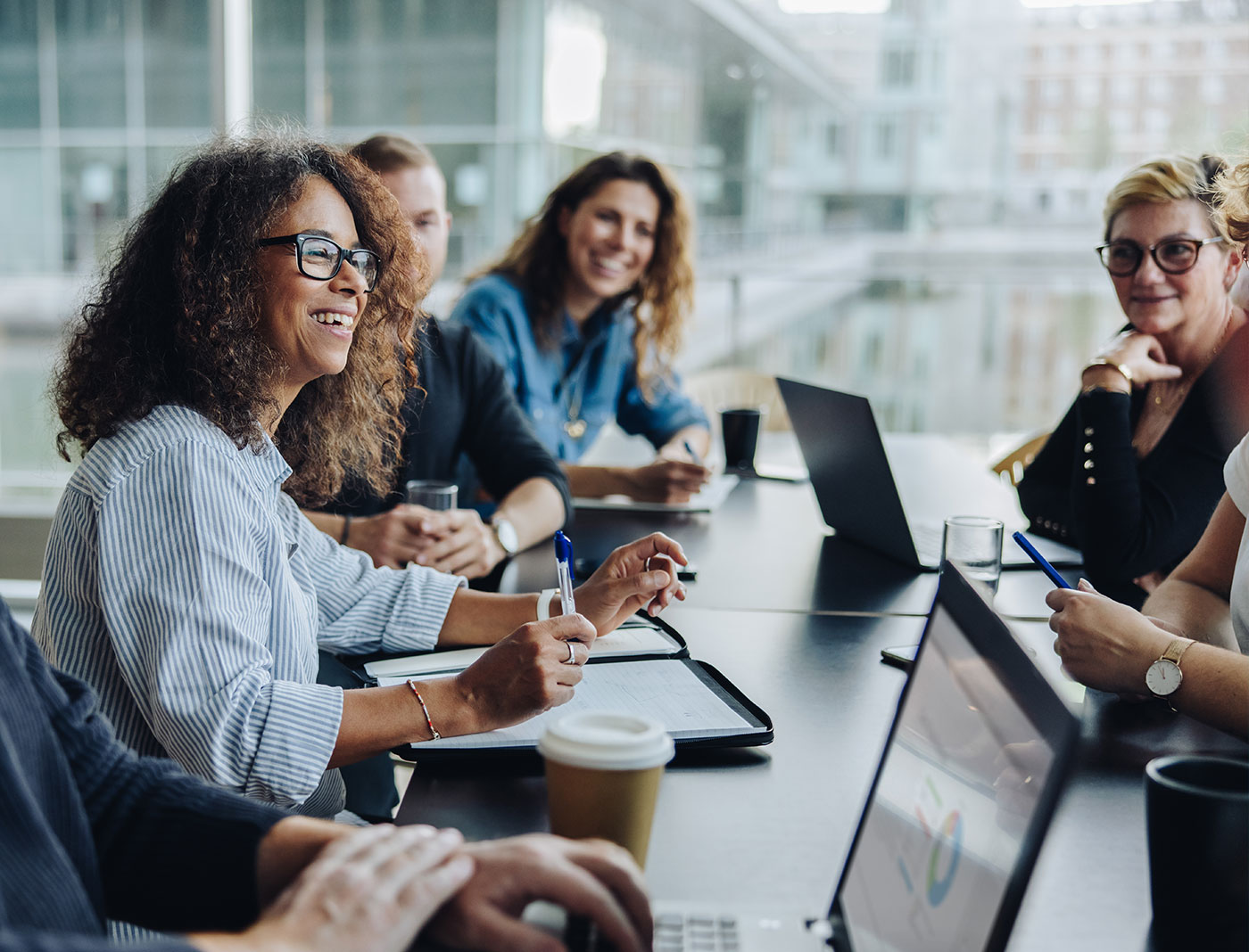 Group of business people collaborating around a table